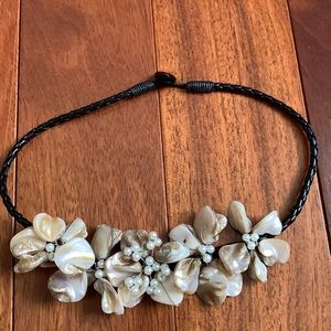 Shells and pearls necklace.